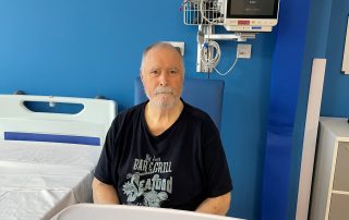 Stephen sat next to his bed in the new acute medical unit (AMU)
