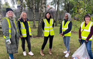 Volunteers from Avison Young in an outdoor space at Walsall Manor