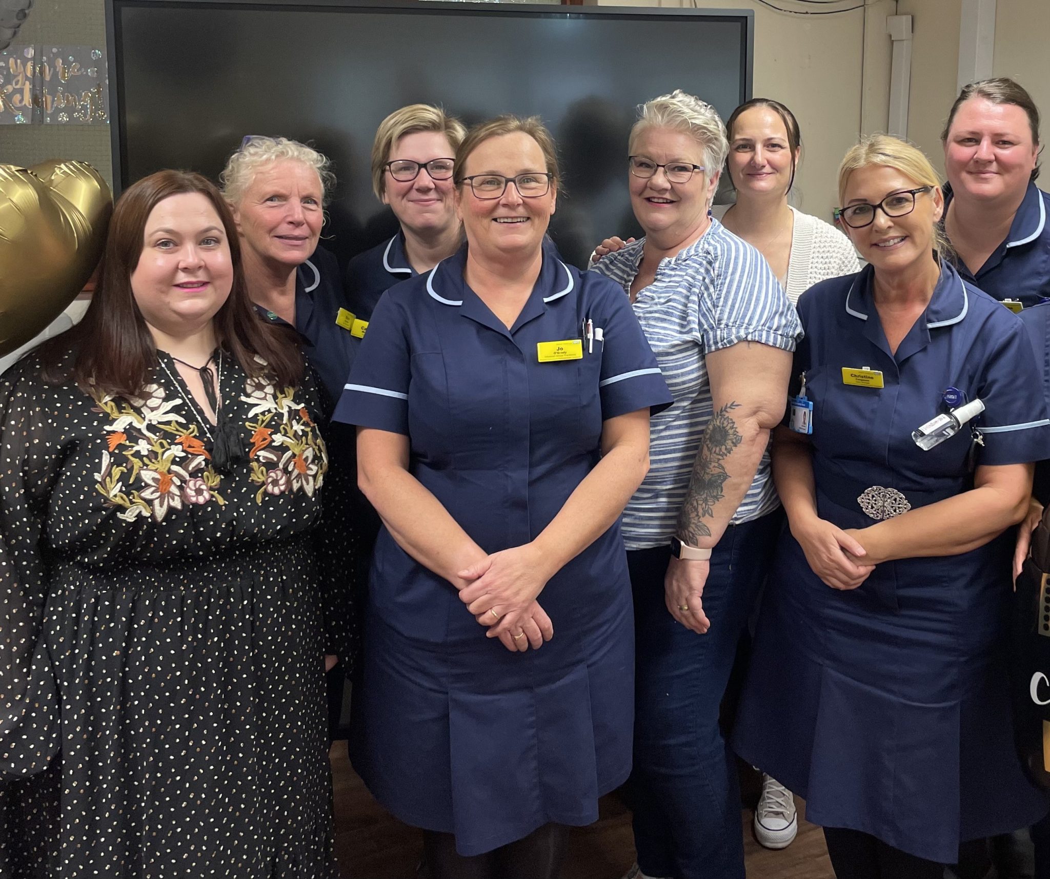 Jo, centre, with a few of her colleagues.